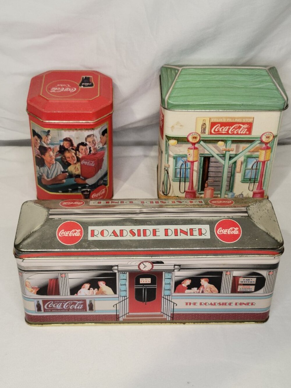 Lot of 3 Coca Cola Collectible Storage Tin Containers Pre-Owned.